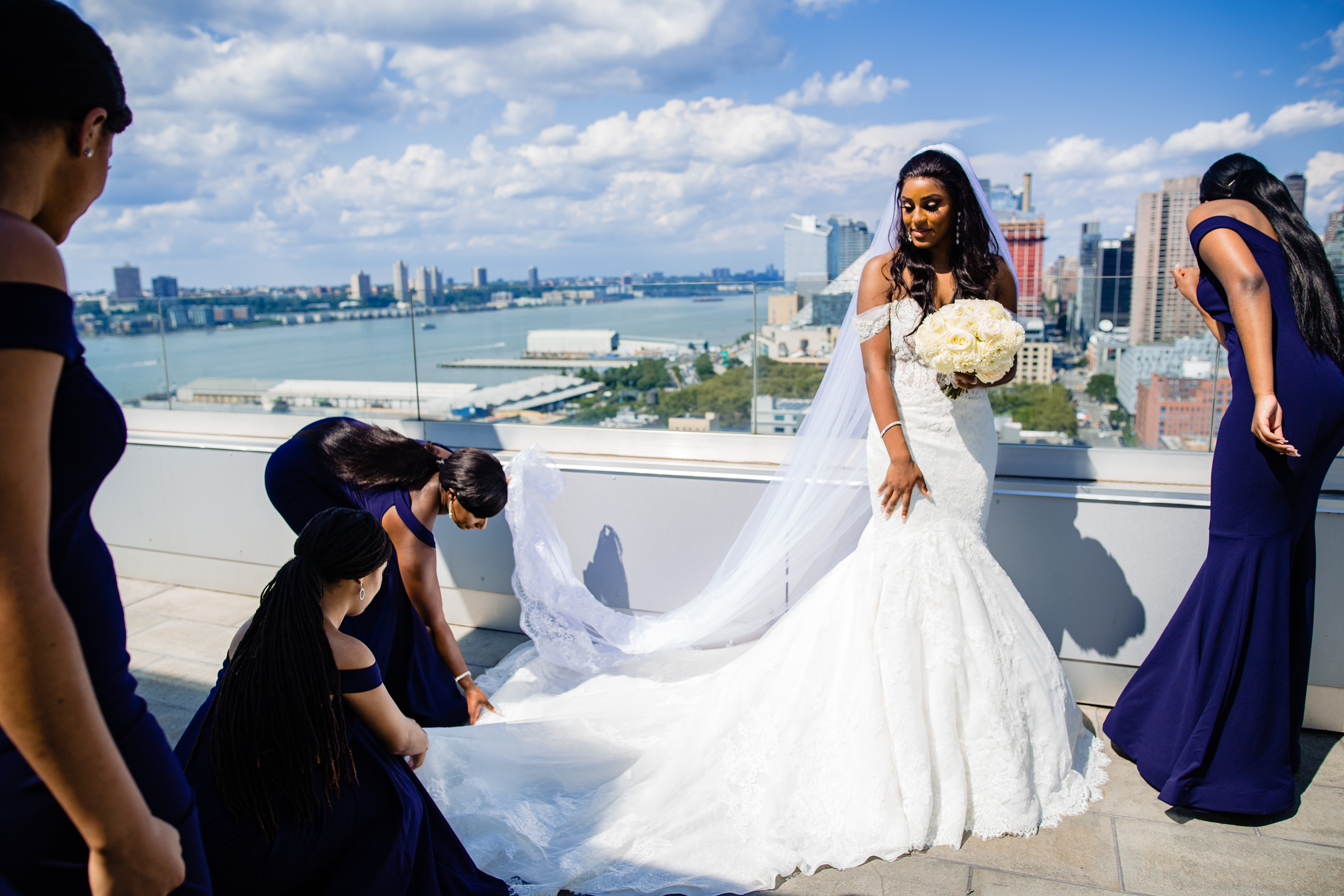 Bride on NYC rooftop with bridesmaids