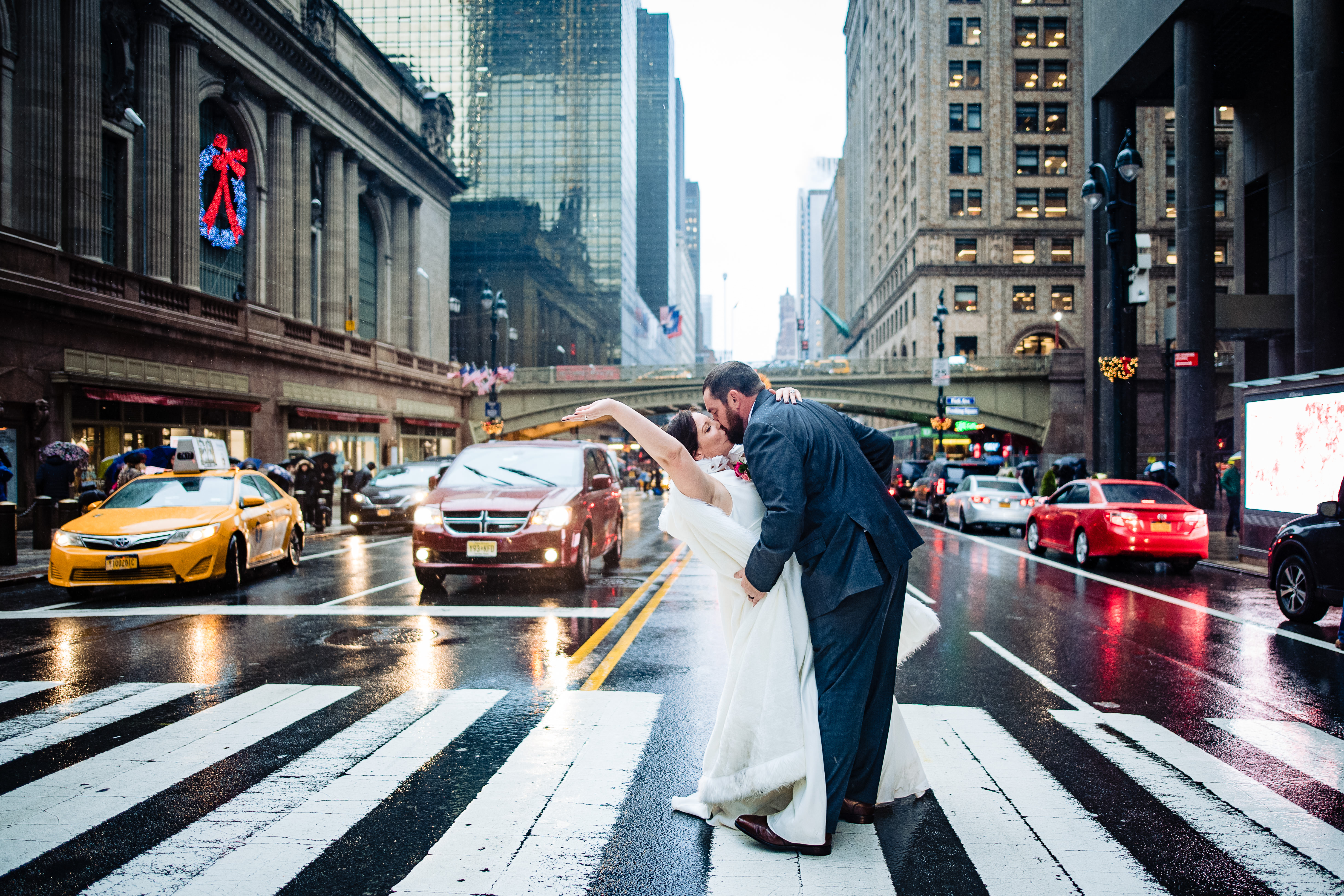 Couple dancing in NYC street rain