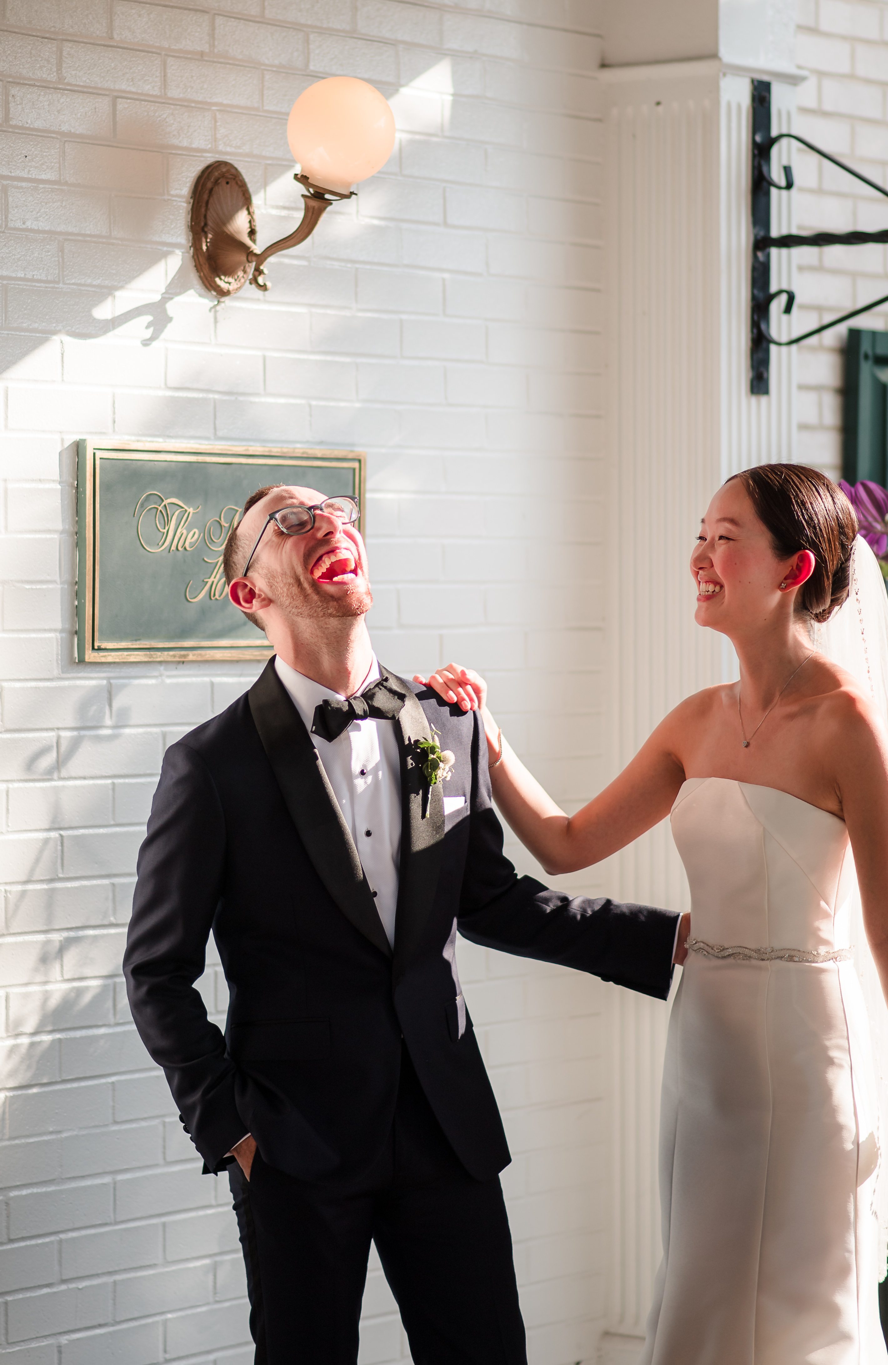 Couple laughing indoors