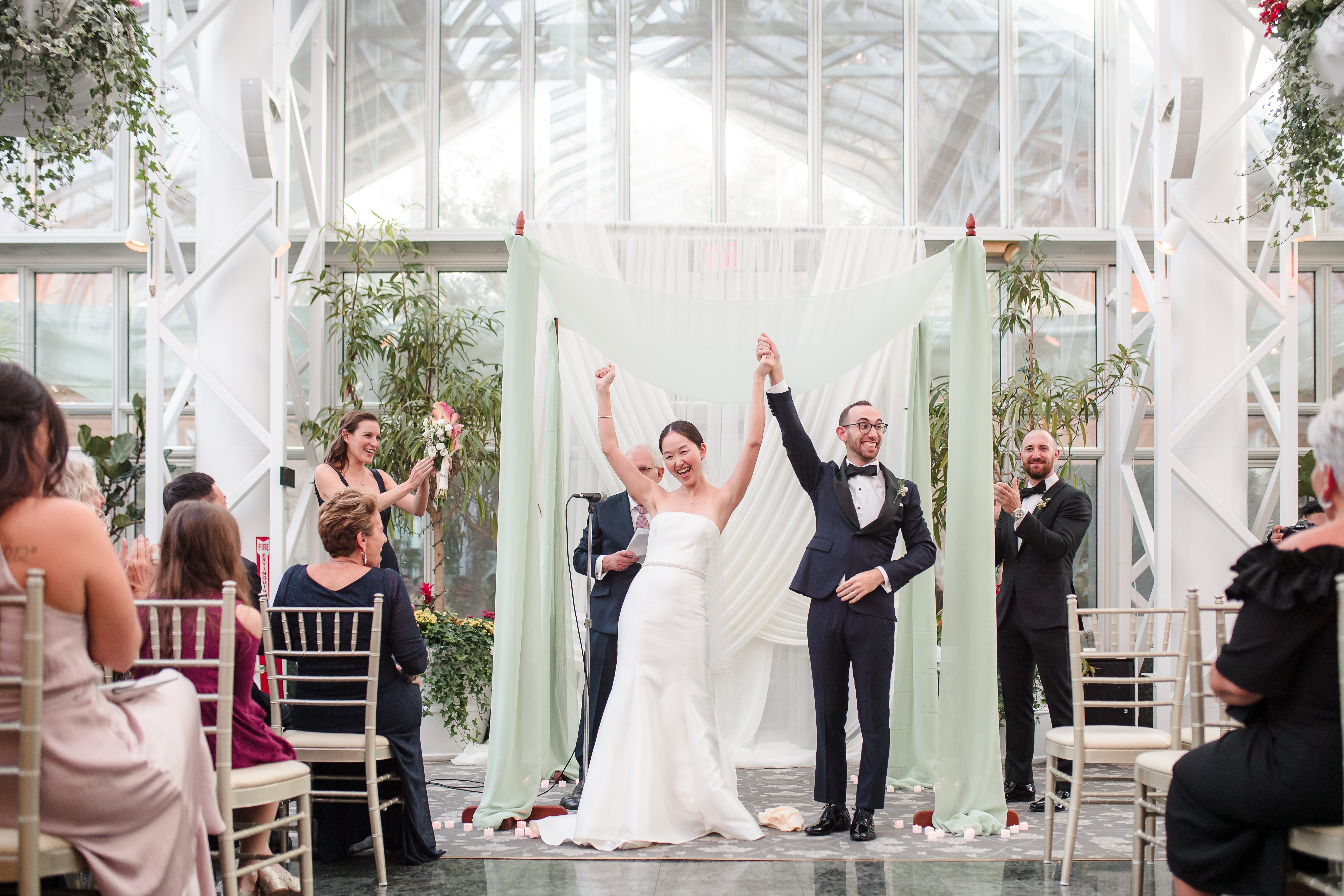 Wide ceremony with crowd celebrating